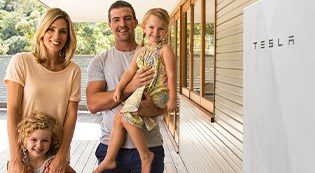 Happy family with Tesla Powerwall 2